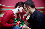 couple-giving-christmas-gifts.jpg